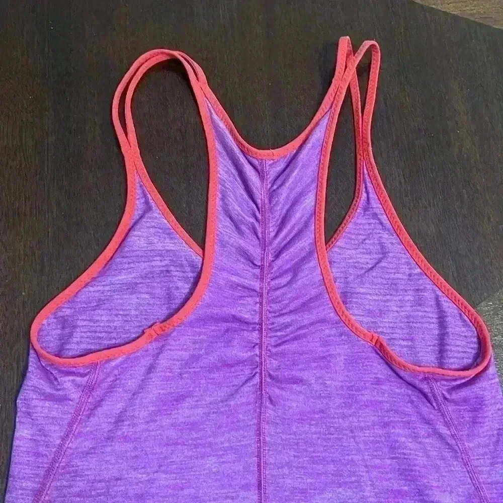Lululemon What The Sport Singlet II
Heathered Ultra Violet / Alarming - Picture 9 of 10